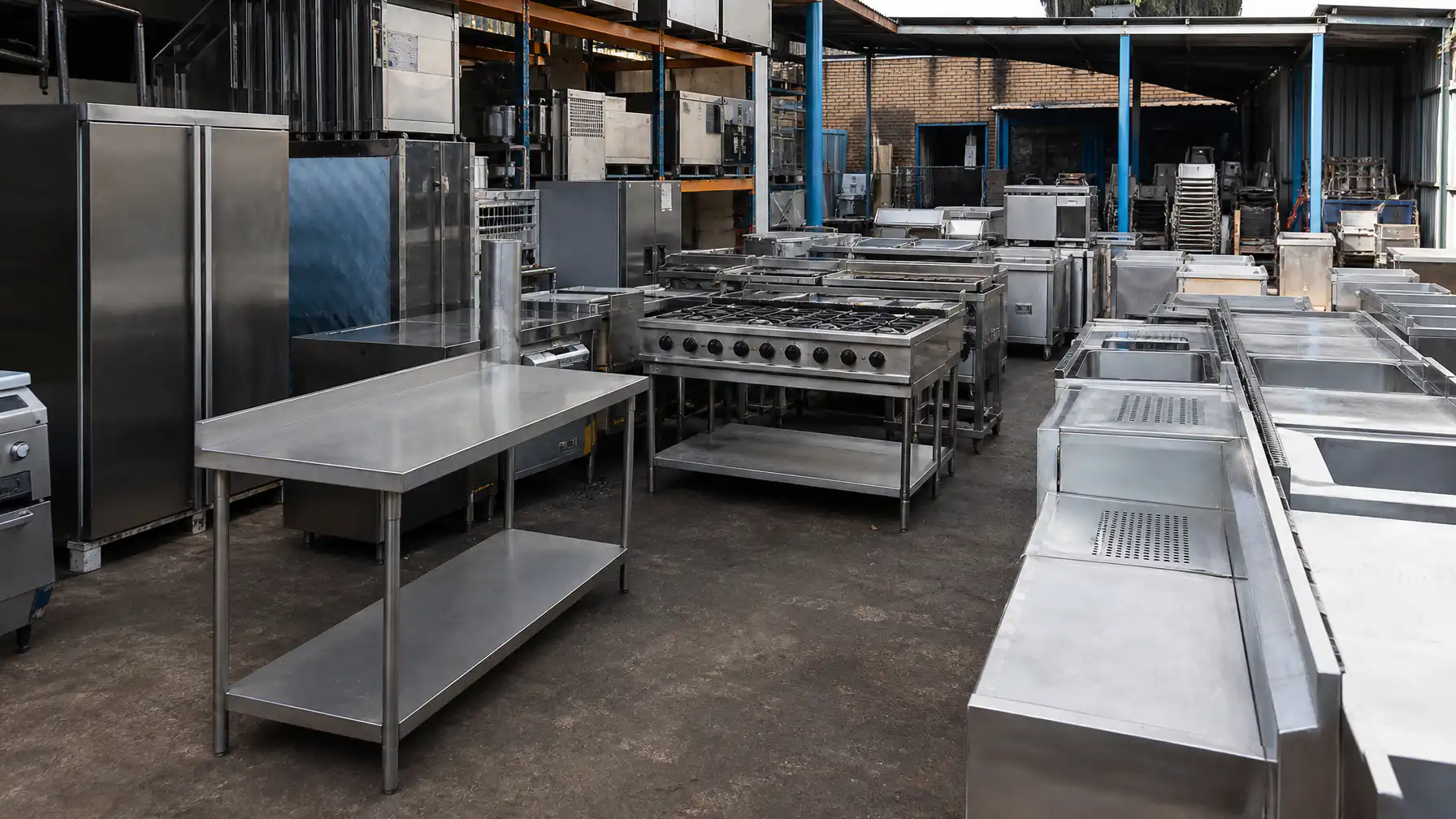 Second-hand catering equipment arranged in a South African equipment warehouse